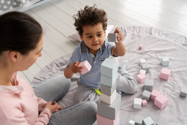 mom and son building blocks